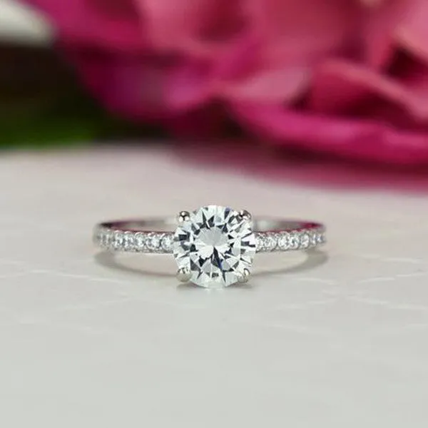 1.25 ctw Round Accented Solitaire Ring