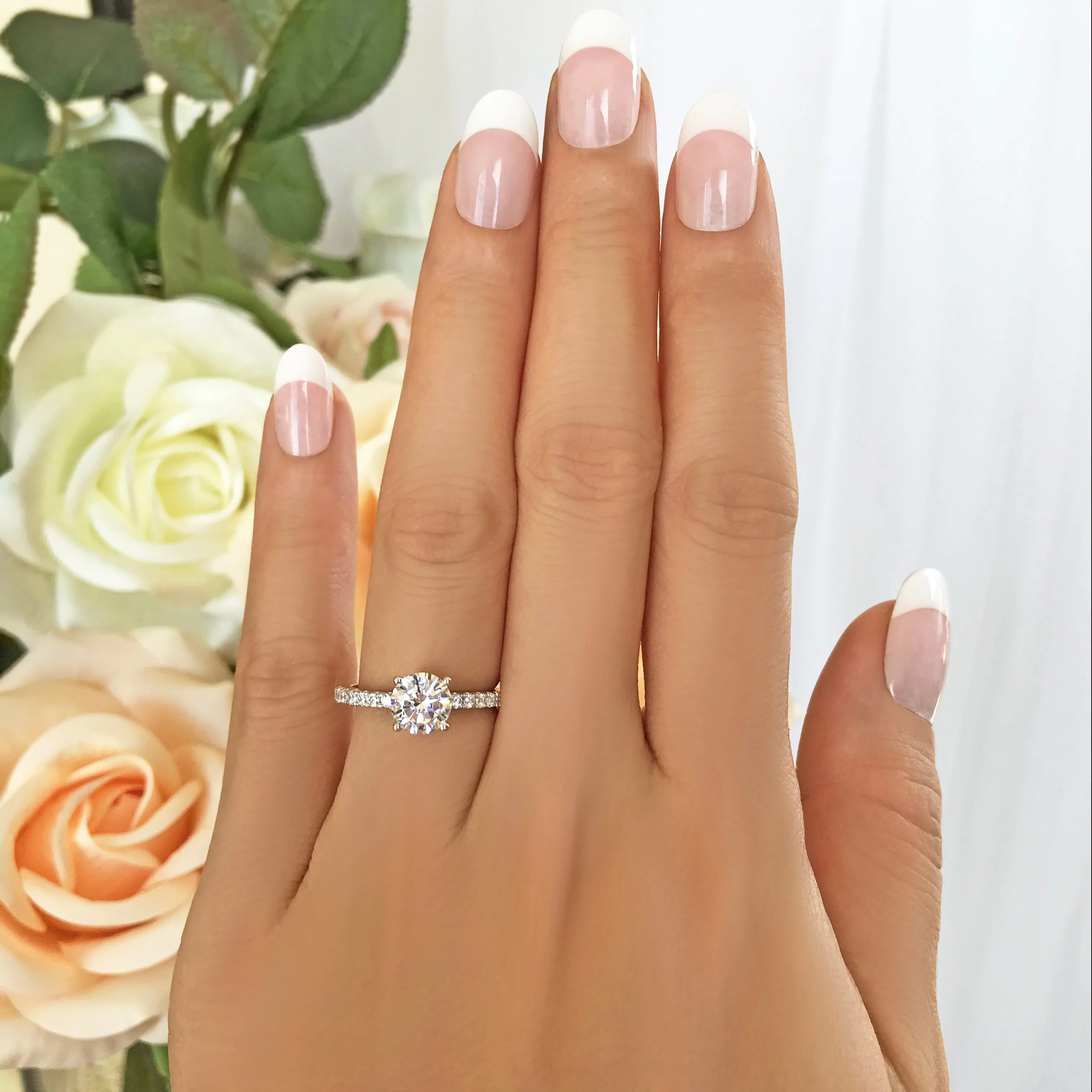 1.25 ctw Round Accented Solitaire Ring