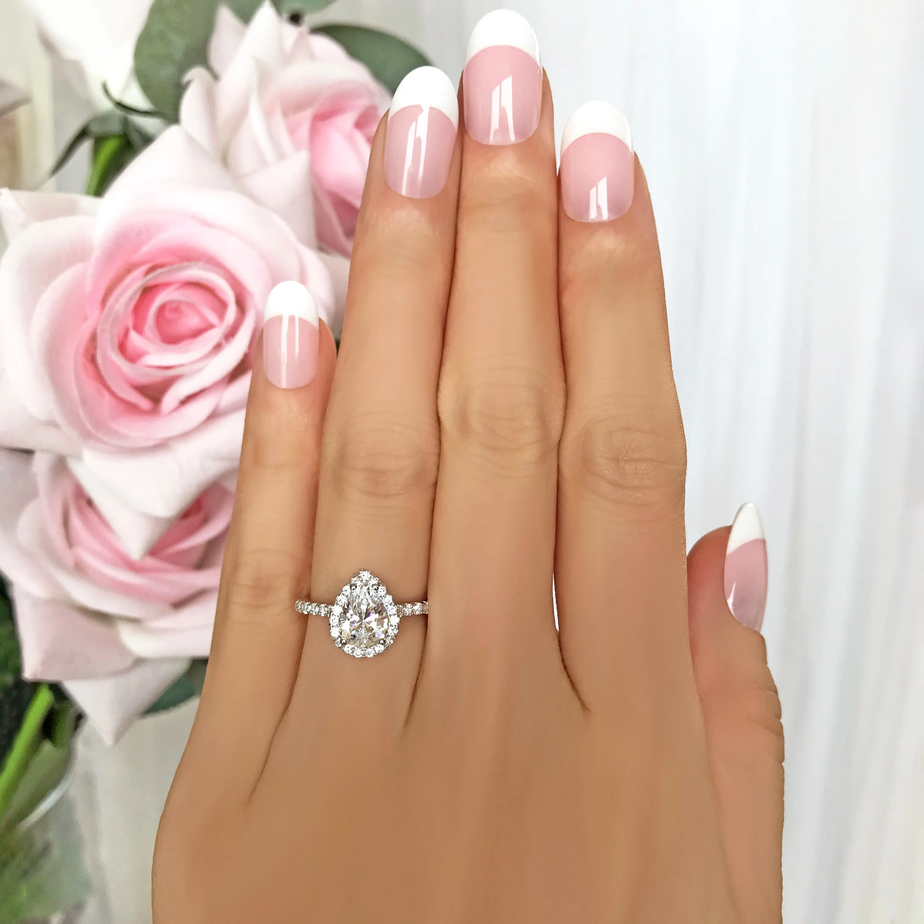 1.5 ctw Pear Halo Ring