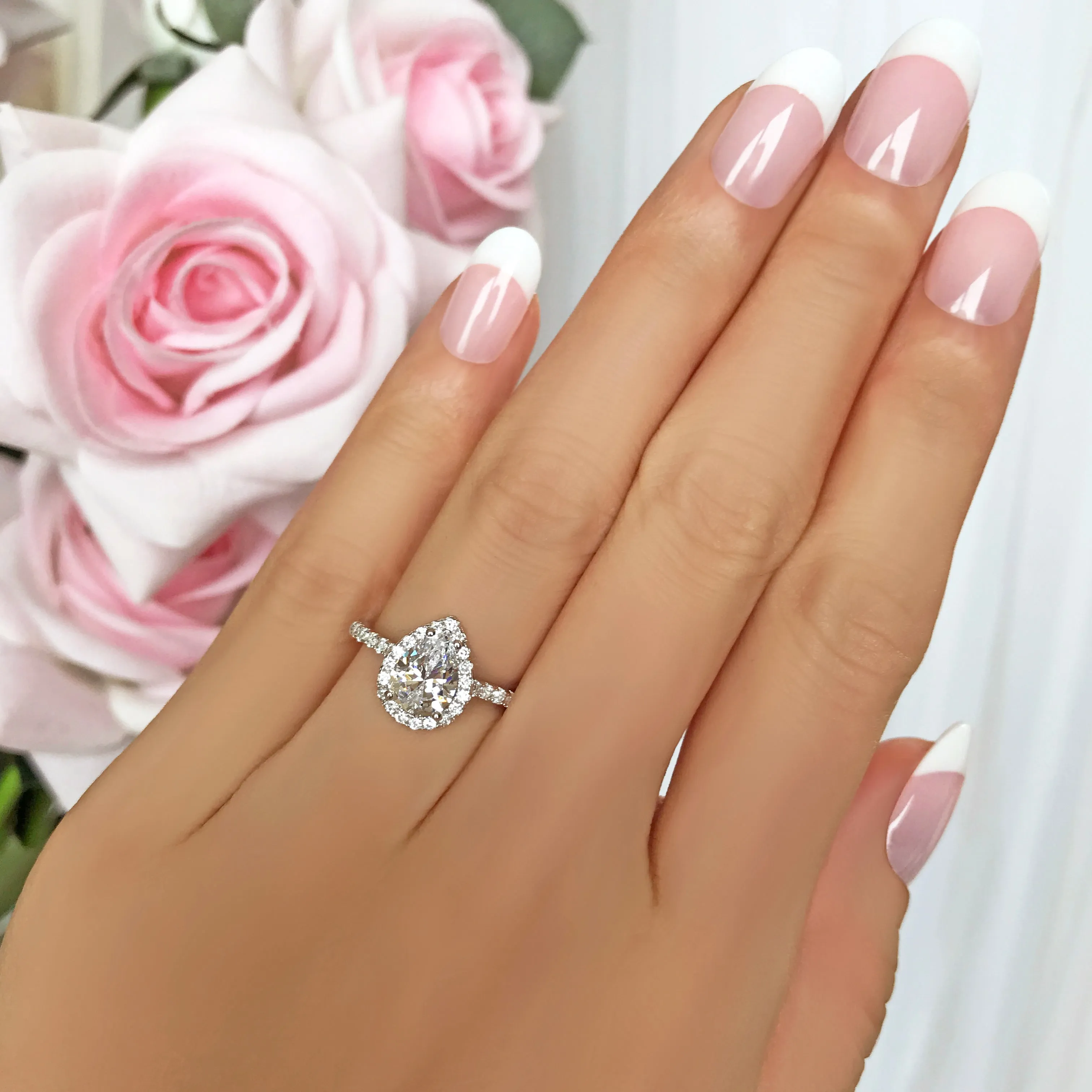 1.5 ctw Pear Halo Ring