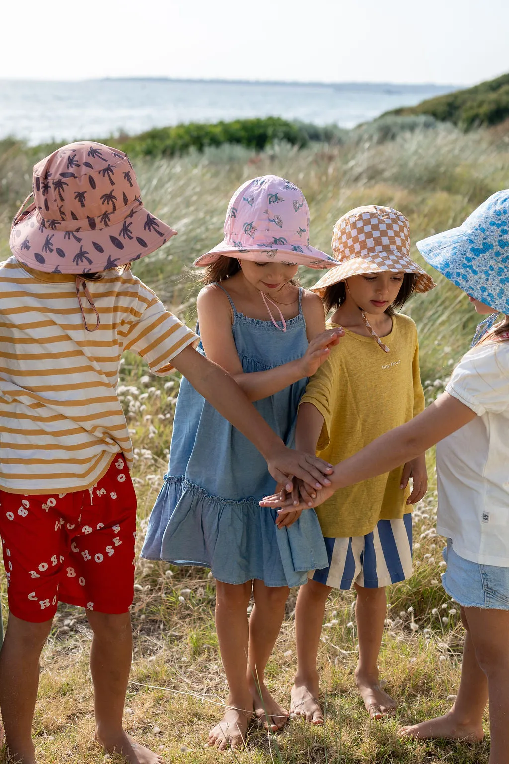 acorn kids: Checkmate Wide Brim Bucket Hat Caramel and Cream