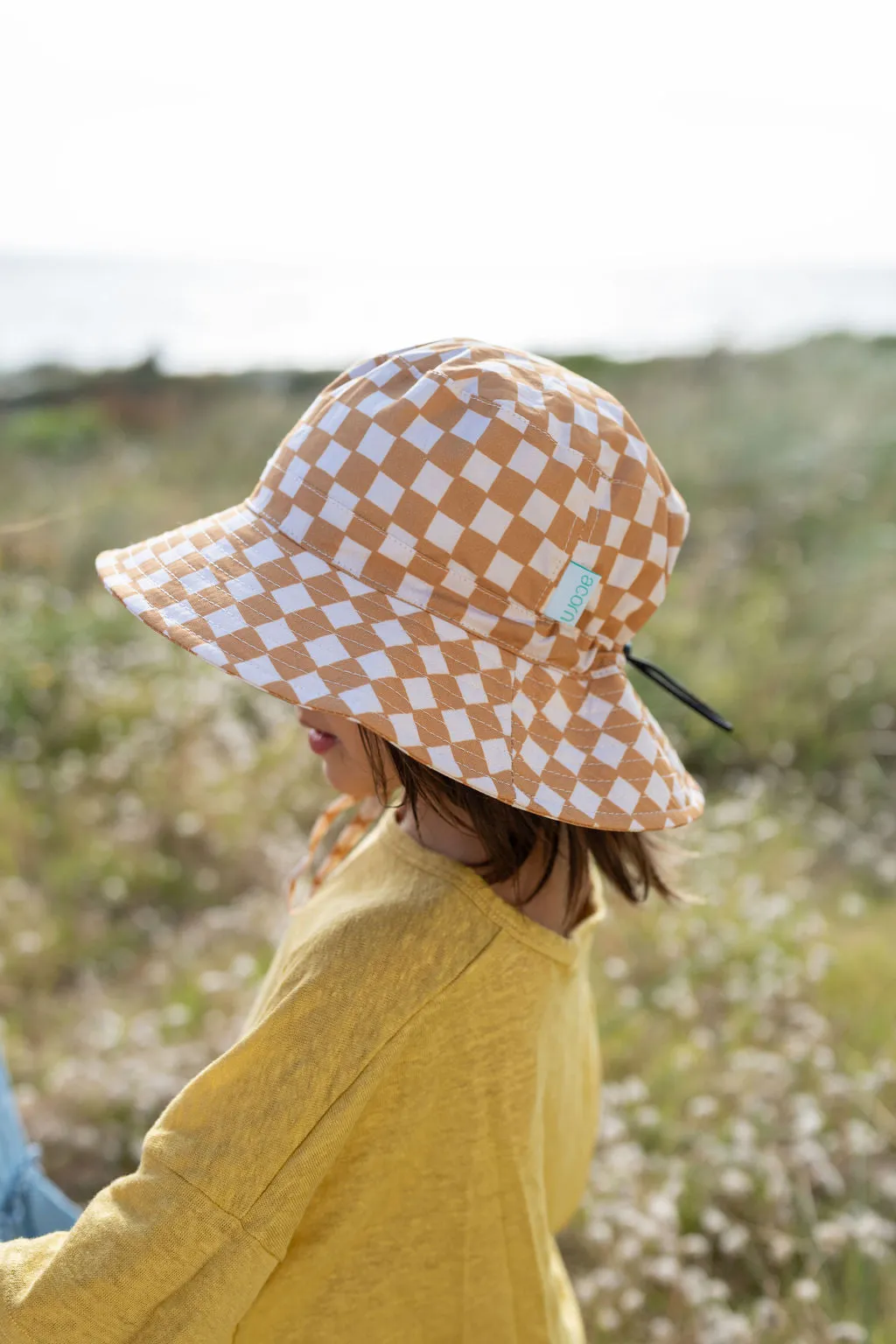 acorn kids: Checkmate Wide Brim Bucket Hat Caramel and Cream