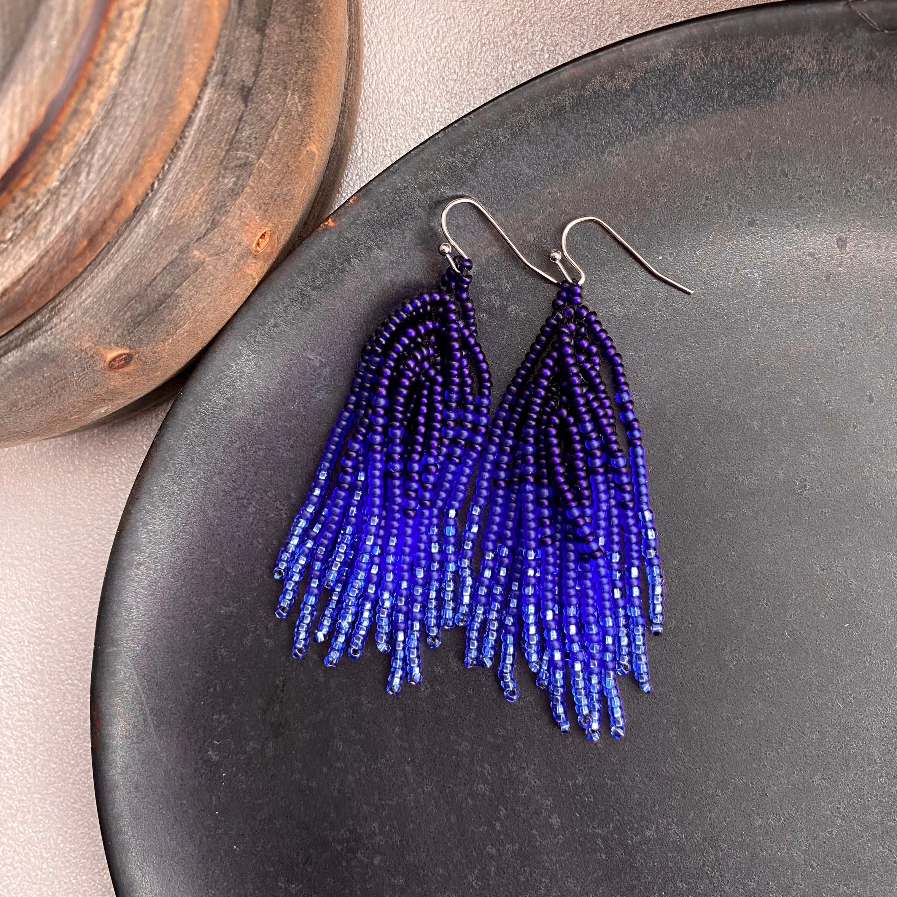 Handmade Blue Ombre Seed Bead Tassel Earrings for Women in boho hippie style.